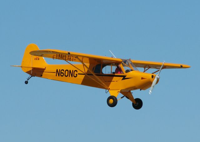 Piper L-21 Super Cub (N60NG) - Nice looking Cub about to touch down at the Downtown Shreveport airport.