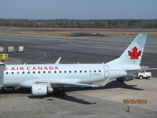 Embraer ERJ 175 (C-FEKJ) - Parked at the gate at Halifax Airport NS. March 20,2010