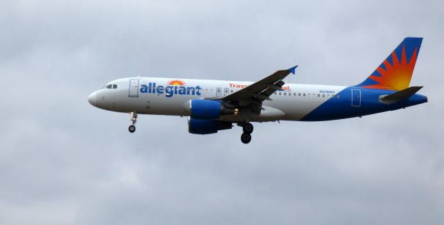 Airbus A320 (N216NV) - About to touch down is this 2000 Allegiant Airbus 320-214 in the Winter of 2024.