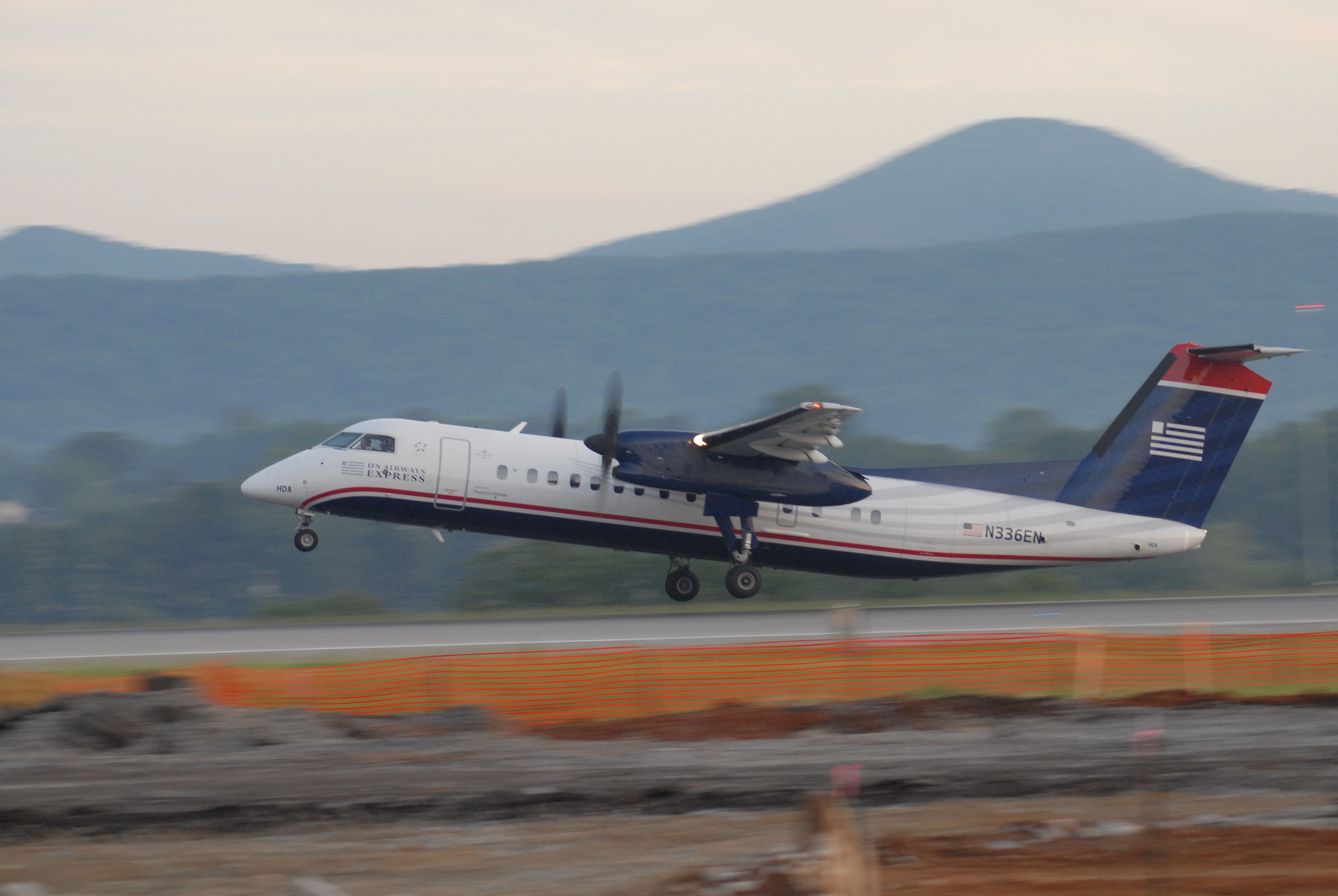 de Havilland Dash 8-300 (N336EN) - Departure from KROA, Rotation with mountains in the background