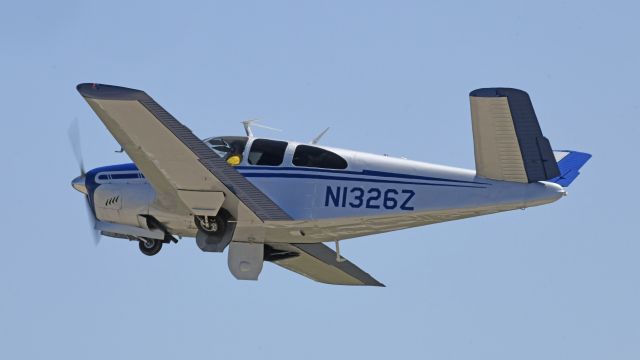 Beechcraft 35 Bonanza (N1326Z) - Departing AirVenture 2023 on runway 36L