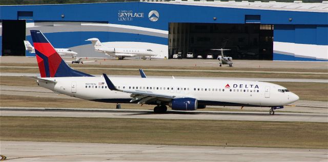 Boeing 737-900 (N819DN) - Landing on 12R from ATL.