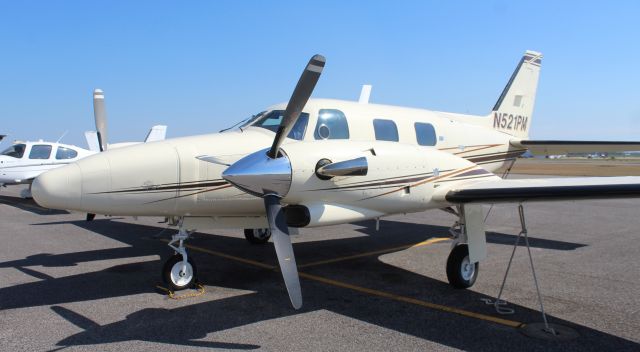 Piper Cheyenne 2 (N521PM) - A 1977 model Piper PA-31T Cheyenne II on the ramp at H. L. Sonny Callahan Airport, Fairhope, AL - near noon, March 6, 2022.