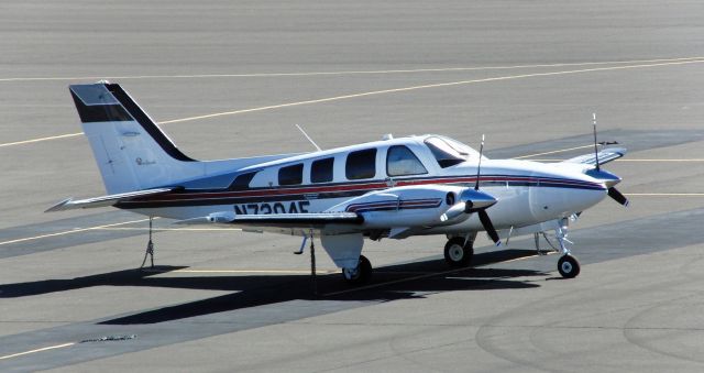 Beechcraft Baron (58) (N7204E) - Aircraft parked near El Aero, Carson City