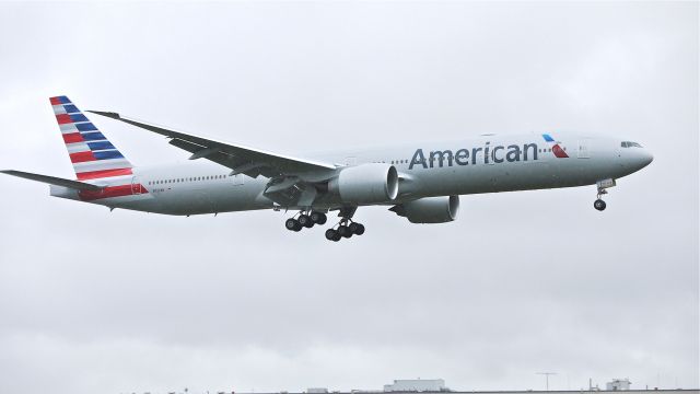 BOEING 777-300 (N722AN) - BOE306 on final approach to runway 16R on a grey and rainy Friday, 4/19/13. (LN:1095 cn 31547).