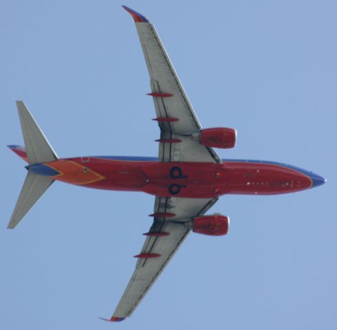 Boeing 737-700 — - Departure from 12L to the South