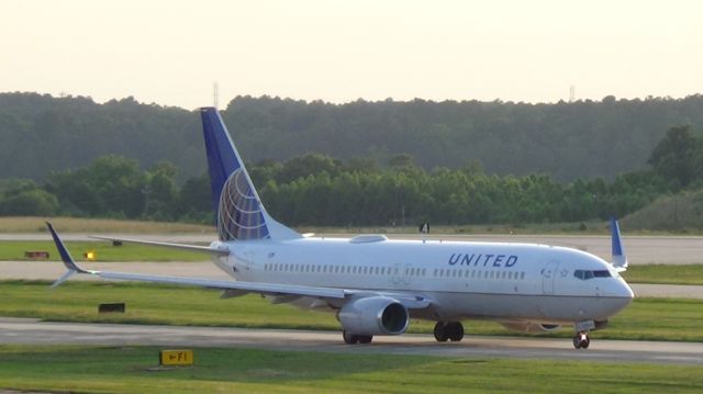 Boeing 737-800 (N76515) - United 1150 departing to Newark at 7 :54 P.M.  Taken June 7, 2015.  