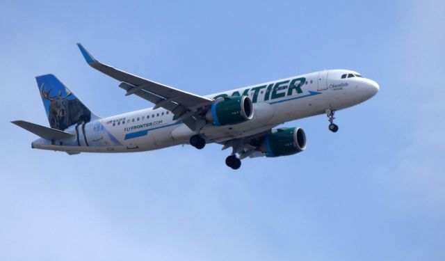 Airbus A320 (N312FR) - On final is "Chocolate" the Moose and this 2017 Frontier Airbus A320-251N in the Spring of 2019. 