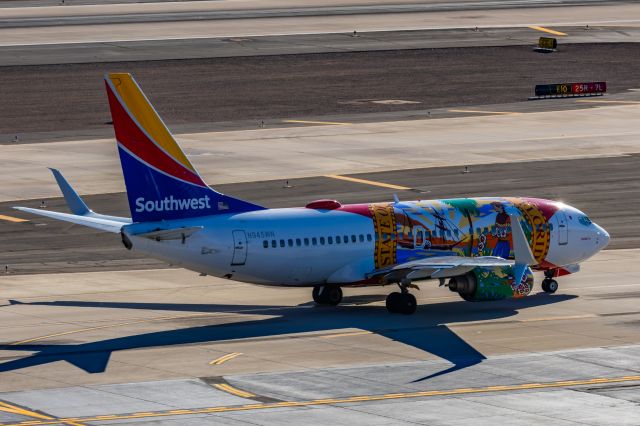 Boeing 737-700 (N945WN) - A Southwest 737-700 in Florida One special livery taxiing at PHX on 2/12/23 during the Super Bowl rush. Taken with a Canon R7 and Canon EF 100-400 II L lens.