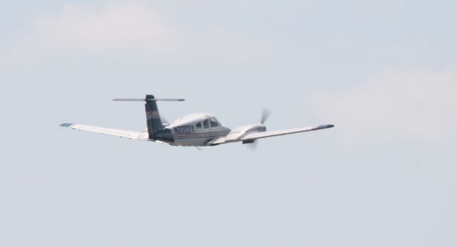 Piper PA-44 Seminole (N2202X) - Picture snapped from the viewing area at KPDK.  This airport has a seating area raised above the fence line for great pictures.  There is a playground, covered picnic area and restrooms.  It would be nice to see this type of area at other airports. 