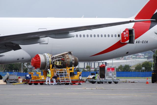 BOEING 777-300 (A6-ECK) - Engine change away from base.