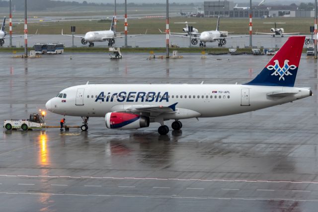 Airbus A319 (YU-APL) - 5th June, 2024: Air Serbia's evening flight JU 357 bound for Belgrade's Nikola Tesla International Airport being detached from the push the back tug at Berlin Brandenburg. 