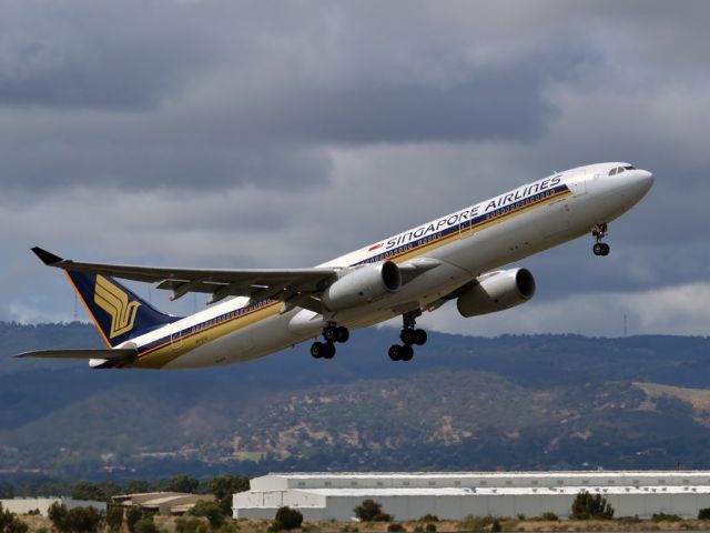 Airbus A330-300 (9V-STK) - Getting airborne off runway 23 and heading home to Singapore. Saturday, 24th March 2012.