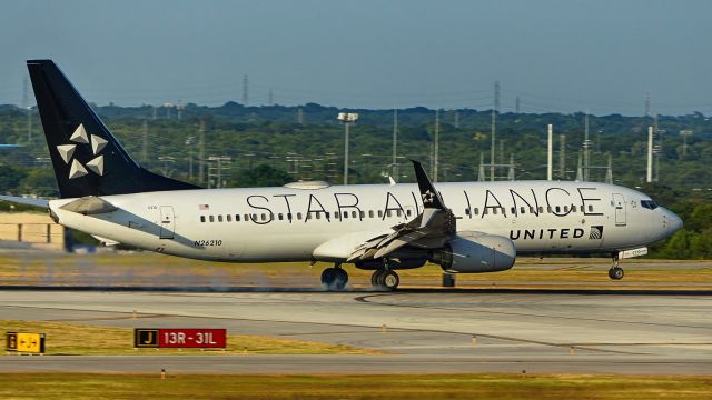 Boeing 737-800 (N26210) - 13R arrival.