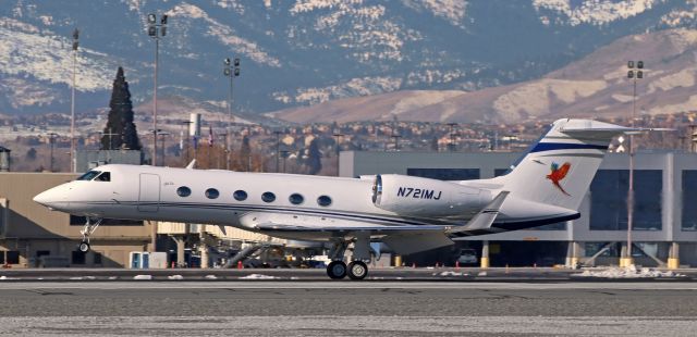 Gulfstream Aerospace Gulfstream IV (N721MJ) - A capture I never really expected to get. Maui Jim's "Aloha One" (N721MJ) has the mains on the runway as it lands on 16R. "Aloha One" was another of the awesome aircraft that paid a visit to Reno last weekend.