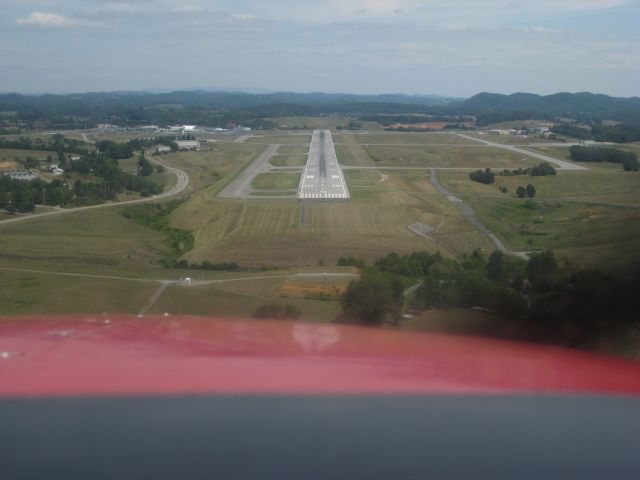 Cessna Centurion (N210SR) - On short final to Runway 5 at Tri-Cities. The only runway open on race day.