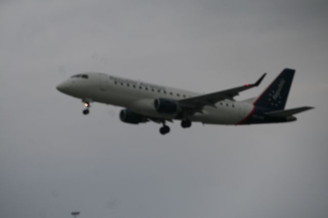 Embraer 175 — - Heading off the CLT on a gloomy day