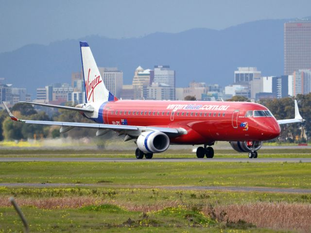 Embraer ERJ-190 (VH-ZPC) - On taxi-way heading for take off on runway 05. Thursday 12th July 2012.