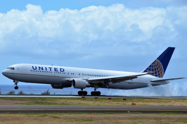 N665UA — - United 767 touching down at Lihue, Kauai, Hawaii.  Shot from the Kauai Lagoons Golf Course.