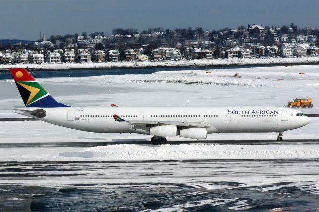 Airbus A340-300 (ZS-SXA) - South African A340-313 at Boston Logan after diverting from JFK due to snow storm on 1/27/2011.