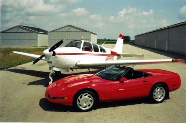 Beechcraft Bonanza (33) (N8698Q) - 1965 Debonaire based at Z98 with the other Red, 1995 Corvette.