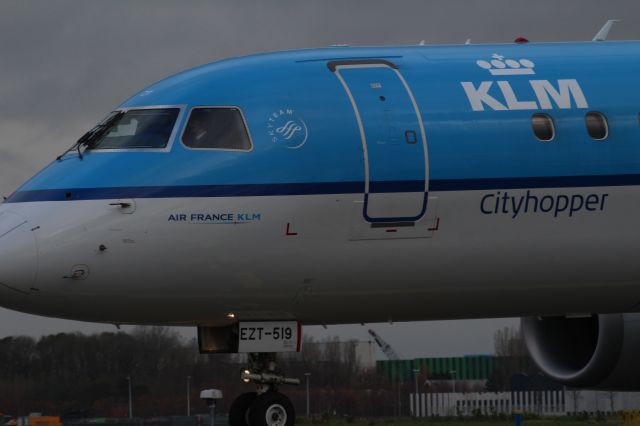 — — - Embraer ERJ190, KLM Cityhopper, taxiing to the runway Polderbaan at Schiphol Amsterdam Airport (Holland).