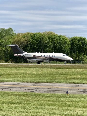 Canadair Challenger 350 (N597FX) - Flexjet Challenger 350 taxing to Runway 11, soon to depart towards Ashville AVL.  The main runway 34/16 is currently closed for repaving.  