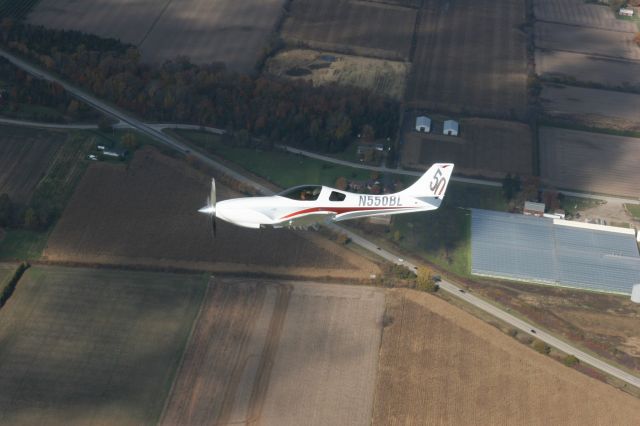 Lancair Legacy 2000 (N550BL) - Formation flight over Windsor, Ontario, Canada