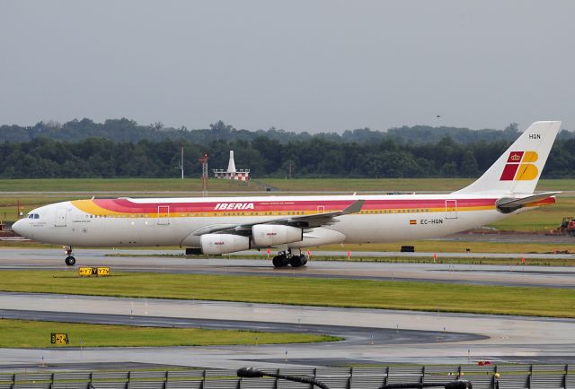 Airbus A340-300 (EC-HQN) - Seen at KIAD on 7/25/2009.  Dark overcast, light rain.