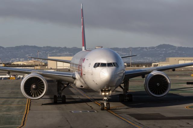 BOEING 777-300 (HB-JNE) - 28th October, 2019: Swiss Air's daily afternoon flight from Zürich is holding short to taxi to the gate at the international terminal at SFO.