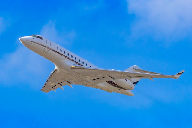 Bombardier Global 5000 (N113QS) - A NetJets Bombardier Global 5000 taking off from PHX on 2/13/23, the busiest day in PHX history, during the Super Bowl rush. Taken with a Canon R7 and Canon EF 100-400 II L lens.