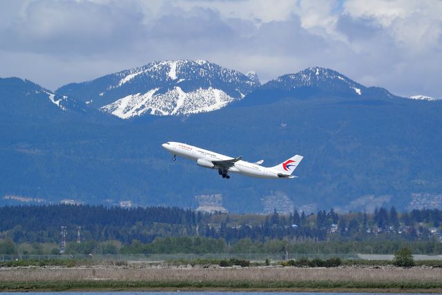 Airbus A330-200 (B-5961) - Departing for PVG with Cypress Mountain Ski area in the background