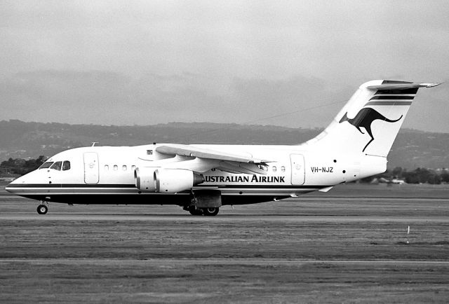 VH-NJZ — - AIRLINK (NATIONAL JET SYSTEMS) BRITISH AEROSPACE BAE-146-100 - REG VH-NJZ (CN E-1009) - ADELAIDE INTERNATIONAL AIRPORT SA. AUSTRALIA - YPAD 20/7/1991