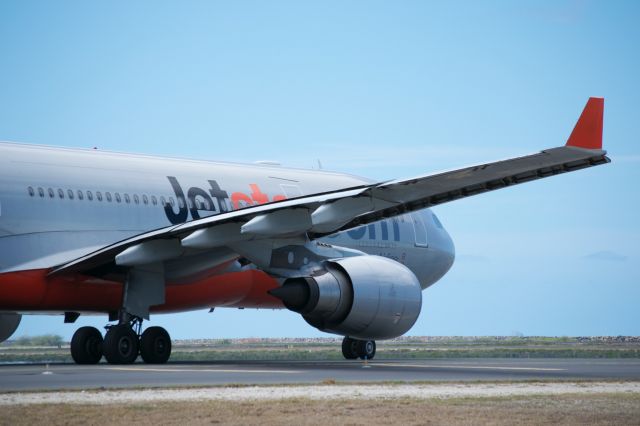 Airbus A330-200 — - Jet Star Airbus A330-200 taxing out to reef runway at PHNL.