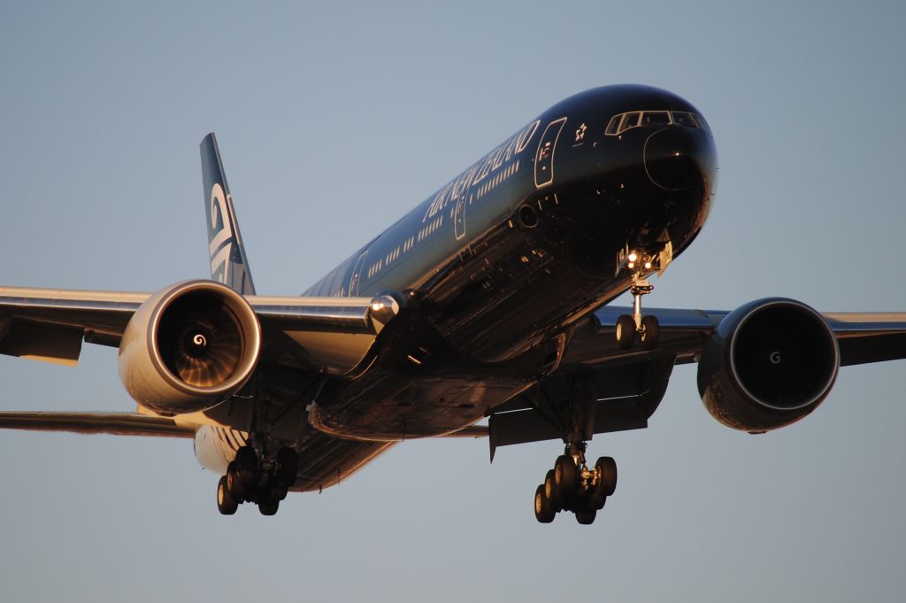 BOEING 777-300ER (ZK-OKQ) - The ALL BLACKS liveried jet arrives KLAX in evening light!