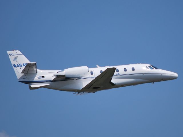 Cessna Citation Excel/XLS (N404MM) - MARTIN MARIETTA MATERIALS EQUIPMENT LLC departing runway 20 at KJQF - 5/24/12