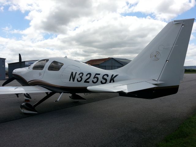 Cessna 400 (N325SK) - At Grenoble may 10, 2013 - an infrequent Columbia/Cessna 400 in France
