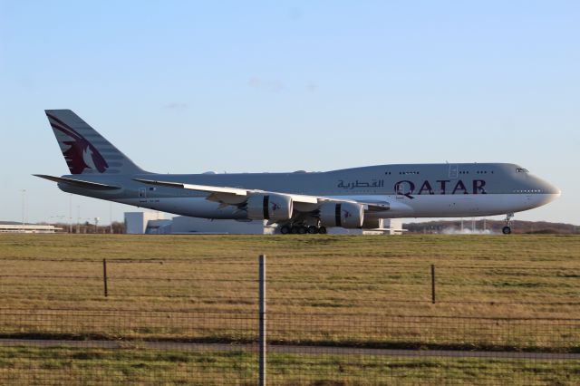 BOEING 747-8 (A7-HHF) - A Qatar Amiri Flight B747-800 BBJ slowing down after landing on runway 22 at STN.br /br /Location: Stansted Airport.br /Date: 26.12.22 (dd/mm/yy).