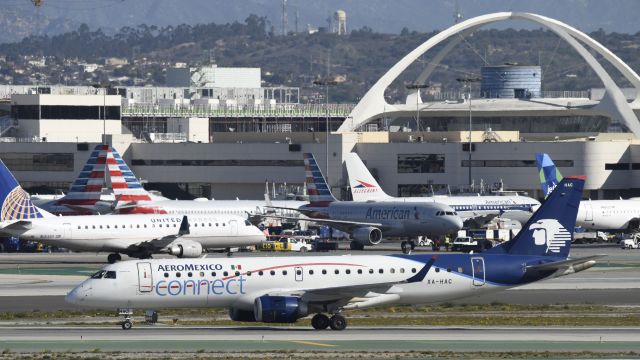 Embraer ERJ-190 (XA-HAC) - Taxiing to gate at LAX after landing on 25L