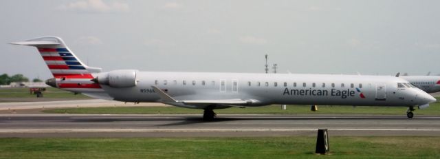 Canadair Challenger (N596NN) - American Airlines/PSA Airlines N596NN/JIA5465 heads off to the departure line, as long as you can see, for departure to KVPS...