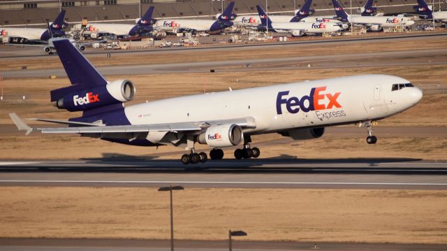 Boeing MD-11 (N591FE) - "Mandy" touching down on 18C. This plane was previously named "Giovanni" and was later renamed "Rachel."