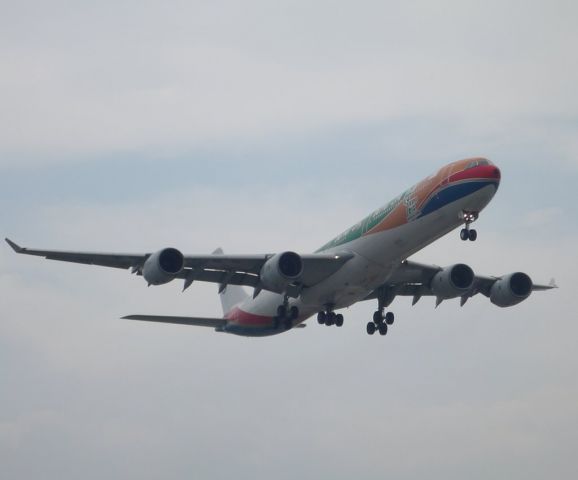 Airbus A340-600 (B-6055) - The first time I ever saw the China Eastern Airlines Airbus A340-600 and it so happens to have the "Expo" paintjob.