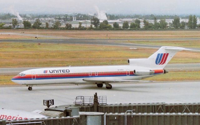 BOEING 727-200 (N7280U) - KSJC - early 1990s with a UAL 727 arriving from ORD or Denver - with Runway 30L being the only Runway for jets back then, and with Runway 30L usually the main action,( not 12R) almost all jets had to taxi by towards the old Terminal C, I was parked on the stop floor of Terminal A garage, weather permitting I'd get a decent photo.