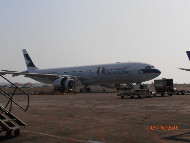 Airbus A330-300 (B-LAG) - Cathay Pacific B-LAG on the ground at Denpasar after an emergency landing. 