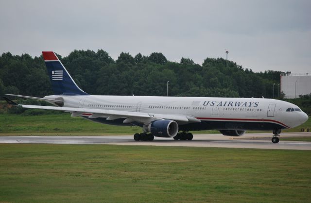 Airbus A330-300 (N275AY) - Rolling 18C - 7/12/10