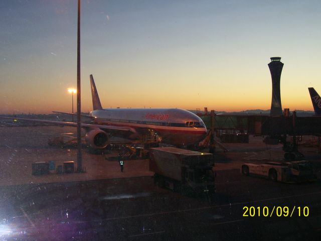 Boeing 777 — - This magnificent 777 is being loaded and prepped for her early morning flight from Beijing to Chicago at the start of a beautiful summer day in China.