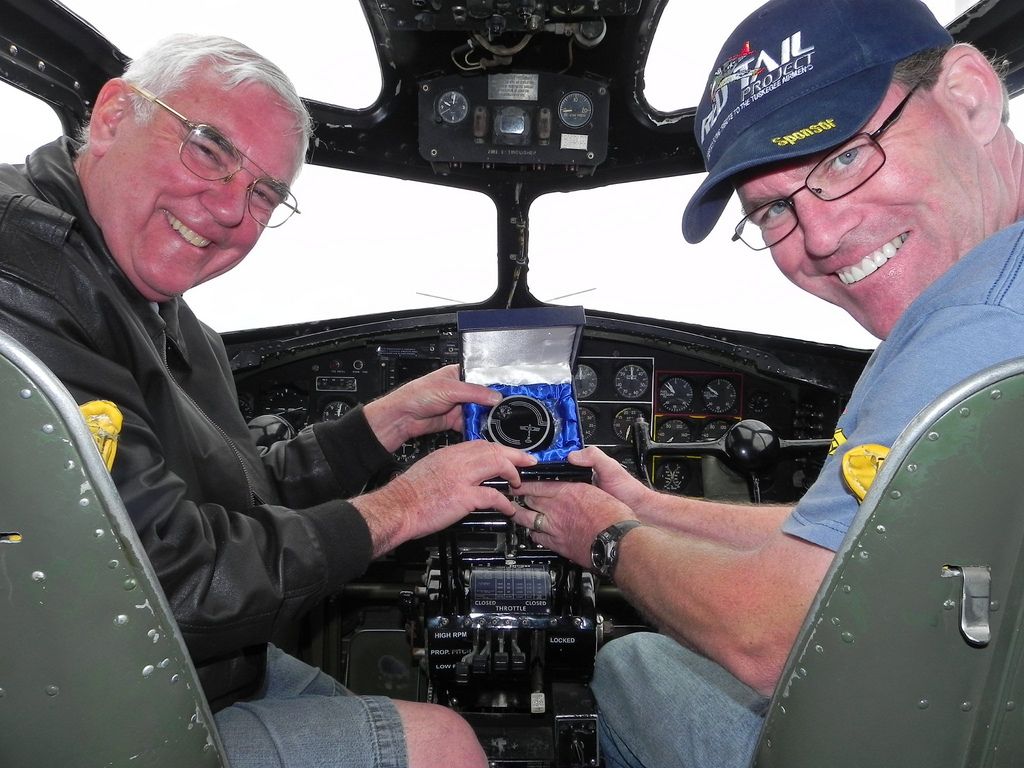 23-1909 — - In the cockpit of the CollingsFoundation (CF) B-17G Nine-O-Nine when donating specially manufactured center yoke caps.  Then pilot for the B-17 is on my left.