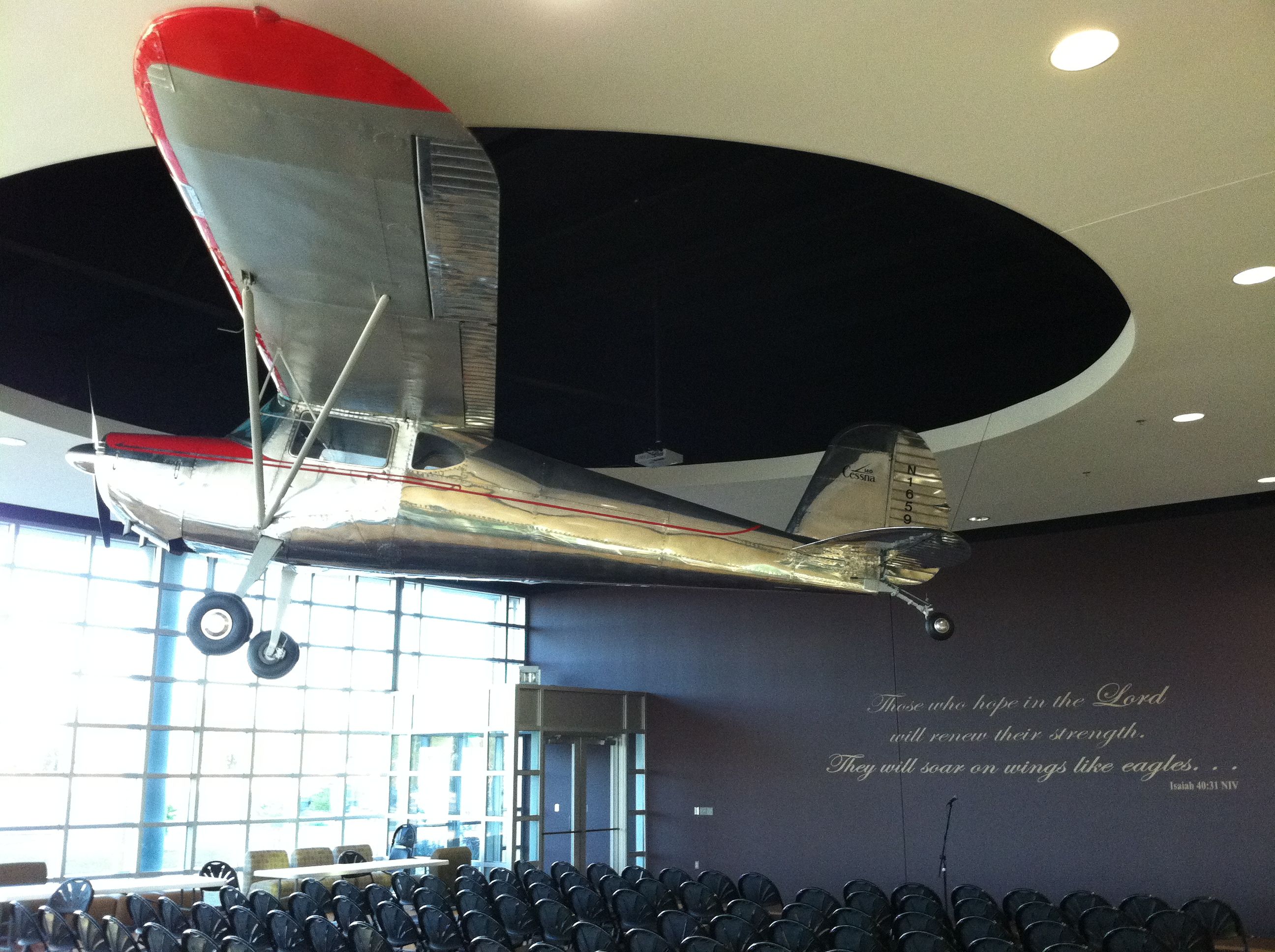 Cessna 140 (N1659V) - Now in polished chrome and hanging above the grand hall in LeTourneau Universitys Abbott Aviation Center.