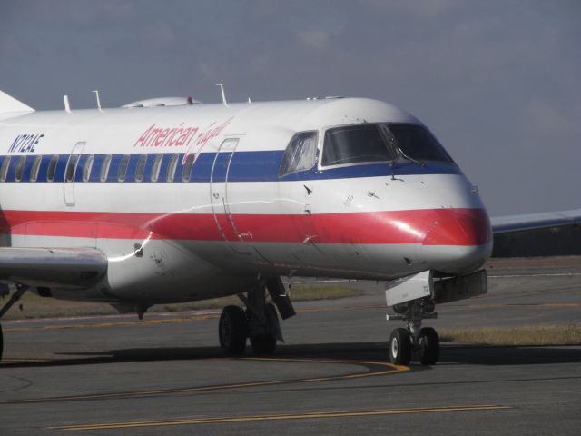 Embraer ERJ-135 (N712AE) - American Eagle flight from Tyler, Texas to Dallas Fort Worth, taxing to runway 22, sometime in 2012.