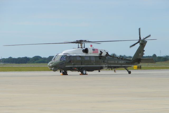 — — - VH-60N WhiteHawk, one of the white top helicopters used as Marine One, sits on the tarmac at Sarasota-Bradenton International Airport awaiting the arrival of President Obama